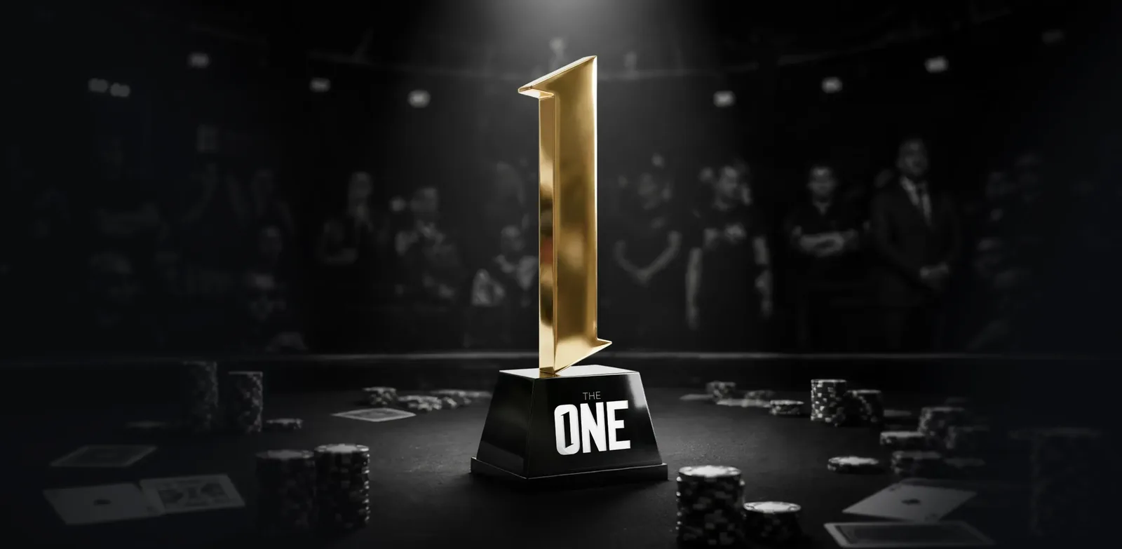 The One trophy, a gold numeral one, on a poker table